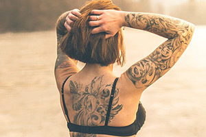 Girl with tattoo on back