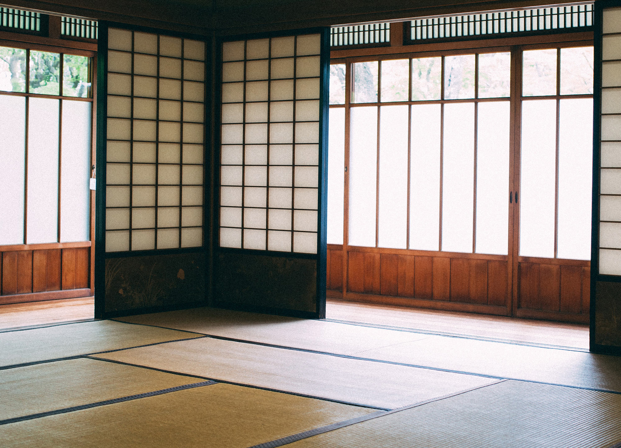 Traditional Japanese home with paper sliding doors and tatami mat